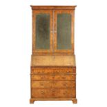 A WILLIAM AND MARY THREE SECTIONAL BURR WALNUT BUREAU BOOKCASE