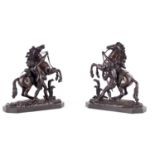A PAIR OF 19TH CENTURY BRONZE MARLEY HORSES