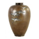 A JAPANESE MIEJI PERIOD BRONZE AND MIXED METAL VASE BY NOGAWA