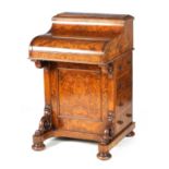 A 19TH CENTURY BURR WALNUT PIANO-TOP DAVENPORT