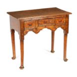 AN EARLY 18TH CENTURY BURR ELM LOWBOY/SIDE TABLE