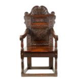 A LATE 17TH CENTURY JOINED OAK WAINSCOT CHAIR