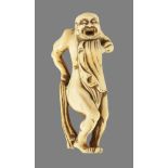 A 19TH CENTURY JAPANESE IVORY NETSUKE