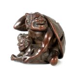 A JAPANESE MEIJI PERIOD CARVED BOXWOOD NETSUKE