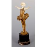 AN EARLY 20TH CENTURY GILT BRONZE AND IVORY FIGURE ENTITLED ‘BALLERINA’ BY FERDINAND PREISS