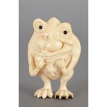A LATE 19TH CENTURY CARVED IVORY SCULPTURE OF A GROTESQUE GARGOYLE