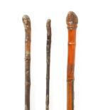 A COLLECTION OF THREE MEIJI PERIOD JAPANESE BAMBOO WALKING CANES