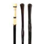 THREE LATE 19TH CENTURY AFRICAN WALKING STICKS