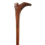 A 19TH CENTURY CARVED MAHOGANY WALKING STICK