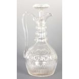 A GEORGIAN CUT GLASS CLARET JUG