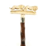 A FINE EARLY 19TH CENTURY CARVED BONE WALKING STICK