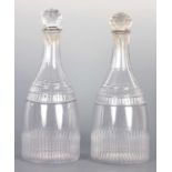 A PAIR OF GEORGIAN MALLET SHAPED CUT GLASS DECANTERS
