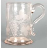 AN EARLY 19TH CENTURY NEWCASTLE ENGRAVED GLASS TANKARD