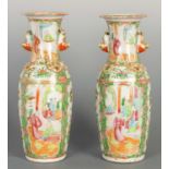 A PAIR OF 19TH CENTURY CANTON FAMILLE ROSE BALUSTER VASES