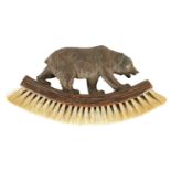 A BLACK FOREST CARVED BEAR CLOTHES BRUSH