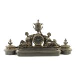 A LATE 19TH CENTURY FIGURAL BRONZE AND BLACK MARBLE DESK CLOCK