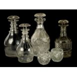 A COLLECTION OF FOUR LATE GEORGIAN CUT GLASS DECANTERS
