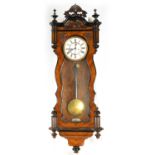 A LATE 19TH CENTURY WALNUT AND EBONISED VIENNA STYLE WALL CLOCK