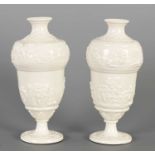 A PAIR OF 19TH CENTURY CAPODIMONTE BLANC DE CHINE PORCELAIN VASES