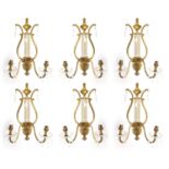 A SET OF SIX REGENCY STYLE BRASS CUT GLASS WALL LIGHTS