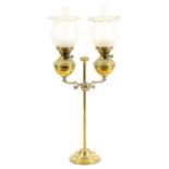 AN UNUSUAL 19TH CENTURY DOUBLE ADJUSTABLE BRASS OIL LAMP