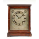 AN EARLY 20TH CENTURY GERMAN MAHOGANY FOUR-GLASS QUARTER CHIMING MANTEL CLOCK