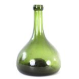 AN 18TH CENTURY GREEN GLASS ONION SHAPED WINE BOTTLE