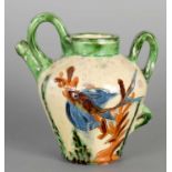 AN EARLY 20TH CENTURY FRENCH POTTERY WINE EWER