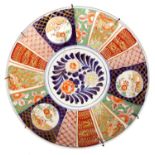 A 19TH CENTURY JAPANESE IMARI PORCELAIN CHARGER