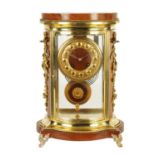 A LATE 19TH CENTURY FRENCH BRASS AND MAHOGANY SPRING DRIVEN MANTEL CLOCK