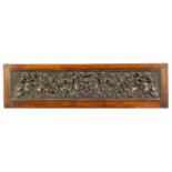 A 19TH CENTURY FRAMED CONTINENTAL CARVED WALNUT PANEL