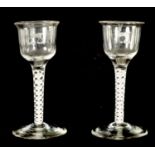 A PAIR OF 19TH CENTURY ARMORIAL WINE GLASSES OF GENEROUS SIZE