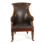 A LATE REGENCY MAHOGANY LEATHER UPHOLSTERED LIBRARY CHAIR