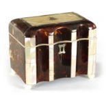 A 19TH CENTURY TORTOISESHELL AND MOTHER-OF-PEARL PANELLED SHAPED FRONT TEA CADDY
