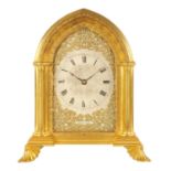 ATTRIBUTED TO THOMAS COLE. A FINE GILT BRASS GOTHIC REVIVAL TWIN FUSEE GILT BRASS STRUT CLOCK OF LA
