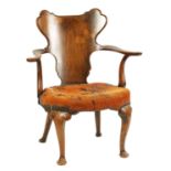 AN EARLY 20TH CENTURY WALNUT OPEN ARMCHAIR IN THE MANER OF GILLOWS