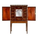 A FINE MID 18TH CENTURY MAHOGANY SECRETAIRE CABINET ON STAND IN THE MANNER OF THOMAS CHIPPENDALE