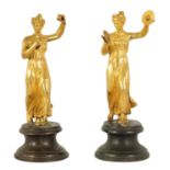 A PAIR OF 19TH CENTURY FIGURAL GILT BRONZE SCULPTURES