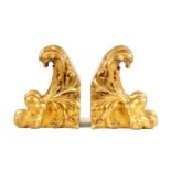 A DECORATIVE PAIR OF REGENCY STYLE CARVED GILT WOOD LIONS PAW BRACKETS