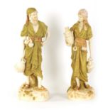A LARGE PAIR OF LATE 19TH/EARLY 20TH CENTURY ROYAL DUX STANDING FIGURES