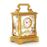 A FRENCH MINIATURE GILT AND ENAMEL PANELLED CARRIAGE CLOCK CIRCA 1900