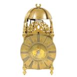 DAVID LESTURGEON, LONDON. A LATE 17TH CENTURY BRASS STRIKING LANTERN CLOCK