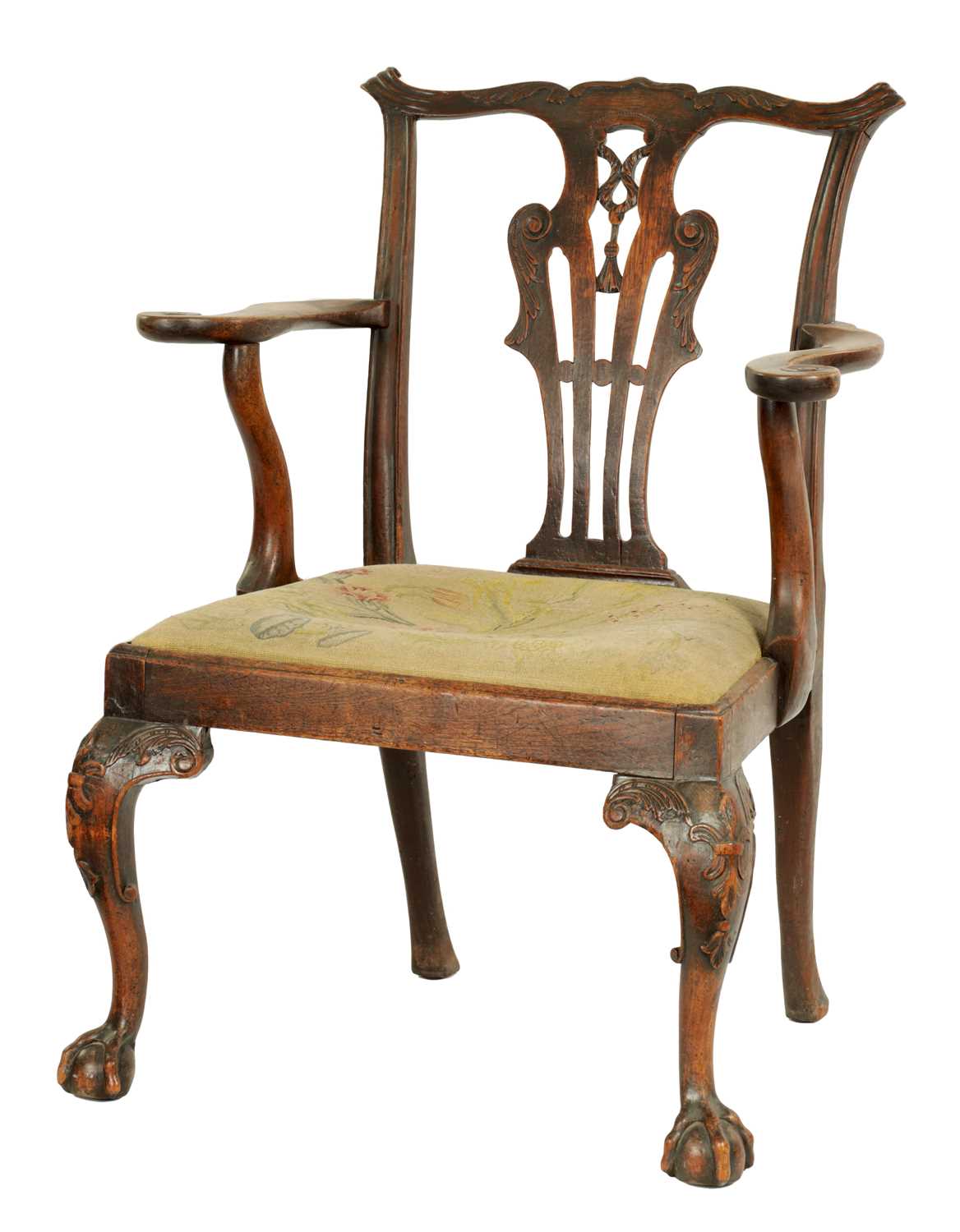 A MID 18TH CENTURY WALNUT OPEN ARMCHAIR IN THE MANNER OF CHIPPENDALE