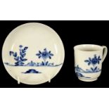 AN 18TH CENTURY WORCESTER TYPE BLUE AND WHITE TEA CUP AND SAUCER