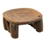 A 19TH CENTURY SOUTH ISLANDS HARDWOOD LOW STOOL/HEAD REST