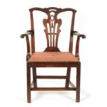 A MID 18TH CENTURY MAHOGANY IRISH CHIPPENDALE STYLE OPEN ARMCHAIR