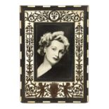 A 19TH CENTURY FLORENTINE IVORY AND EBONY PHOTOGRAPH FRAME