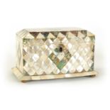 A 19TH CENTURY BOW-FRONTED PARQUETRY INLAID MOTHER-OF-PEARL TEA CADDY