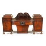 AN EARLY 19TH CENTURY MAHOGANY TEA CADDY FORMED AS A PEDESTAL SIDEBOARD
