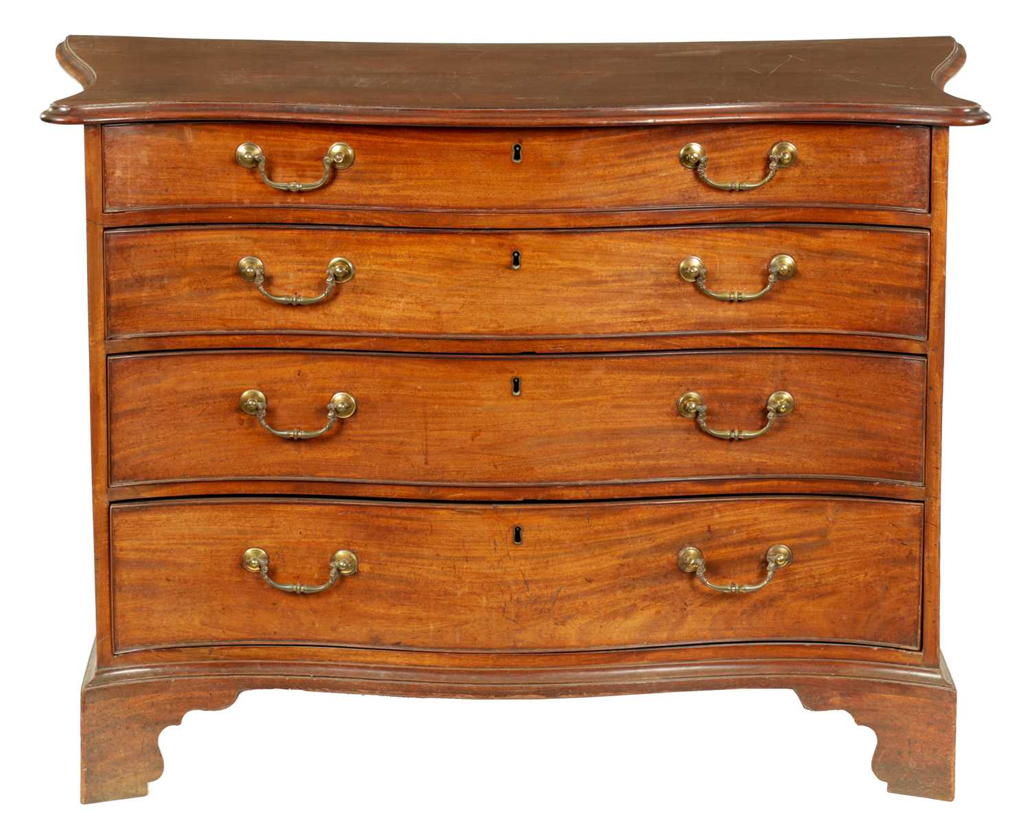 A FINE GEORGE III LOW WAISTED MAHOGANY SERPENTINE CHEST OF DRAWERS